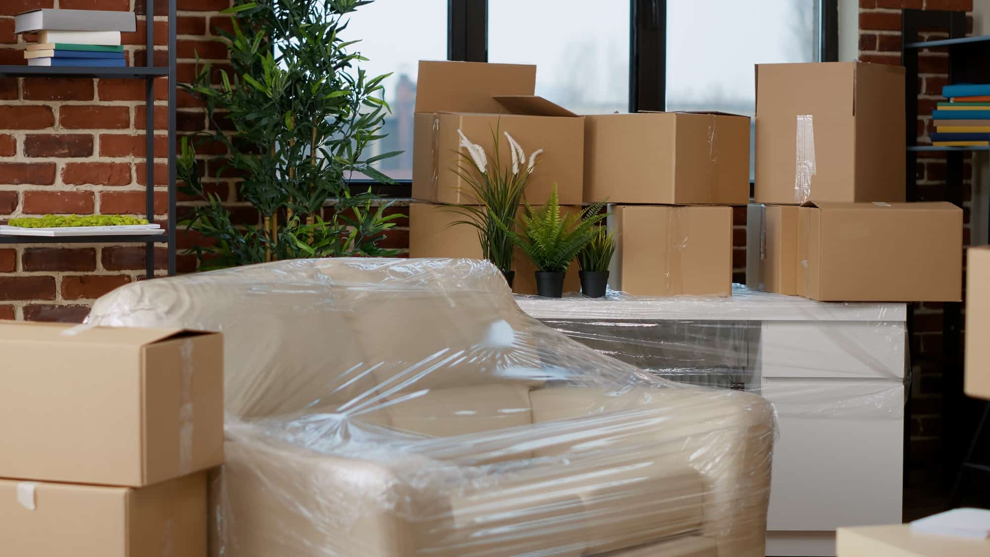 No people in empty apartment space filled with storage boxes